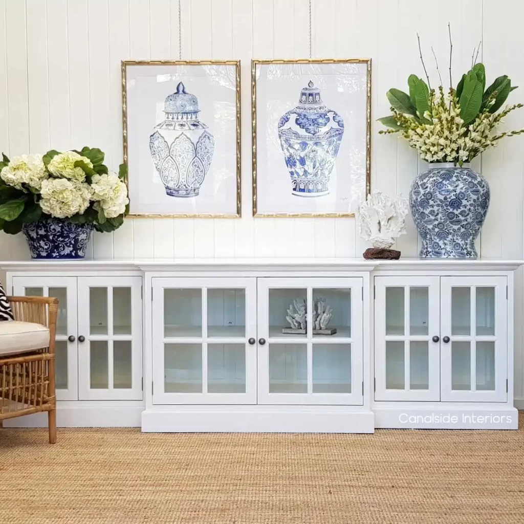 Elegant living room featuring Hamptons style interior design with soft neutral tones and coastal accents.